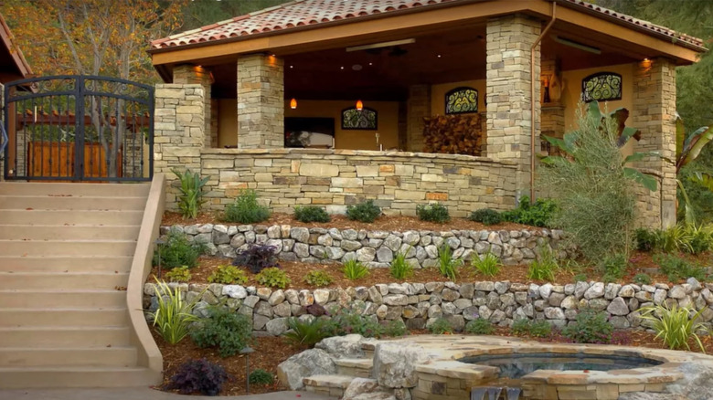 outdoor entertainment area built on a reclaimed slope