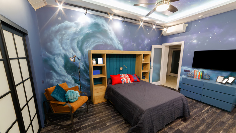 bedroom with a wave mural