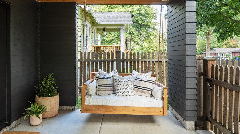 wooden and white porch bench