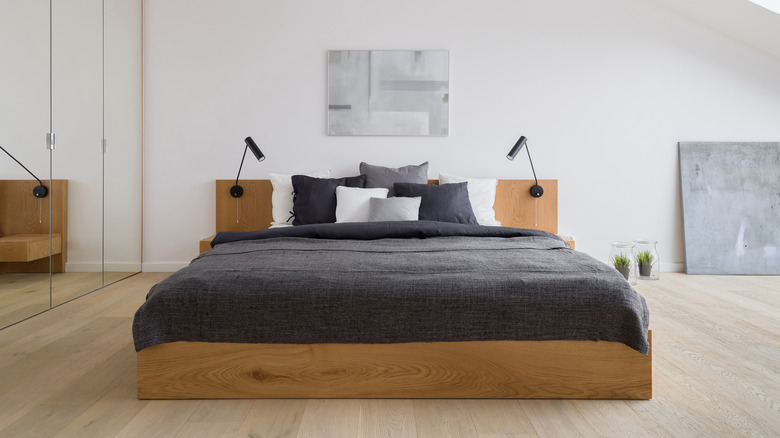 Wooden bed with black spotlights