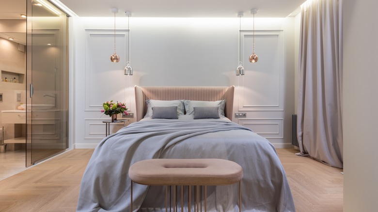 pendants hanging above a bed