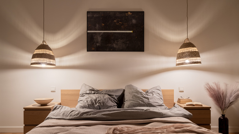 Rattan pendants hanging by bed