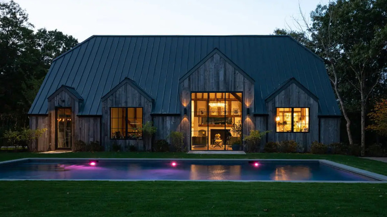 modern barn with a pool