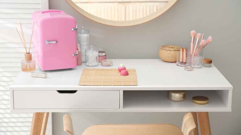Vanity with pink fridge 