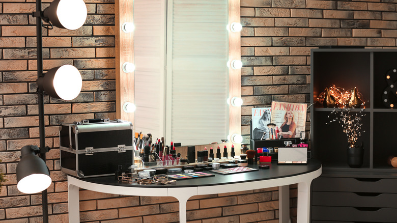 a vanity with lighting 