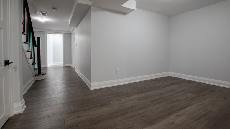 Empty finished basement and staircase