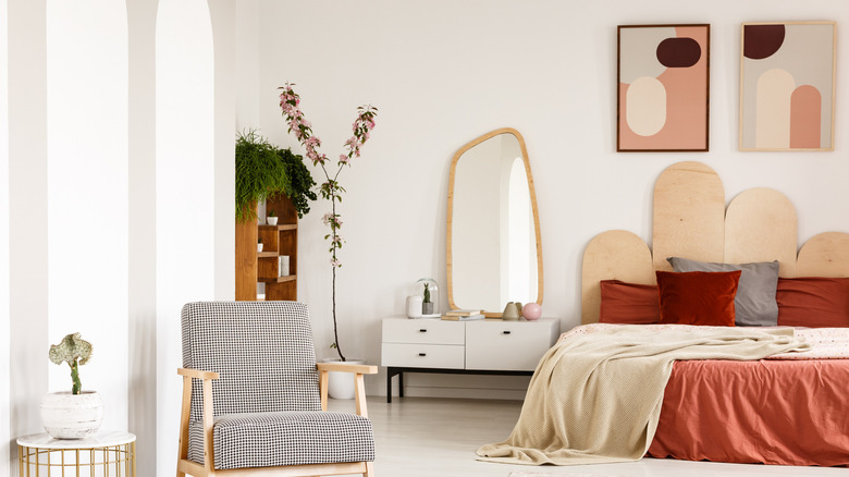 bedroom with artwork