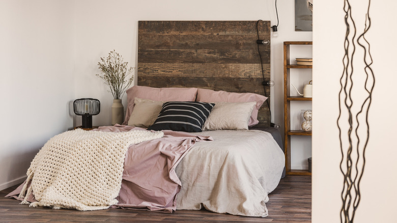 millennial pink in rustic style bedroom