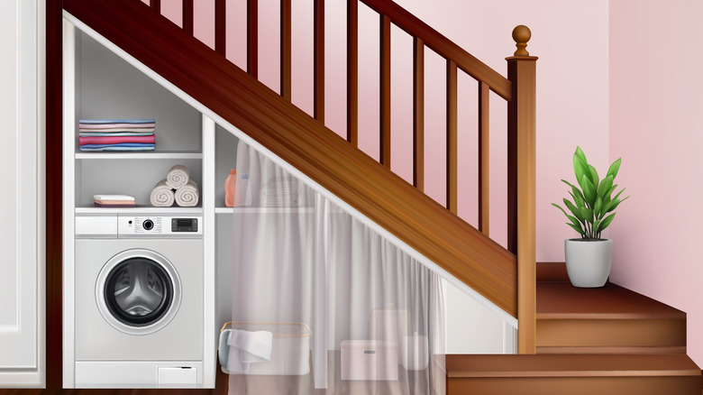 laundry area under stairs