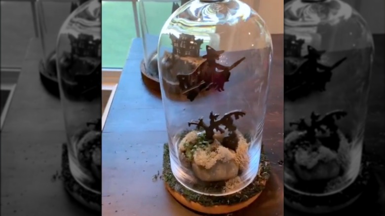 Halloween cloche with flying ghost