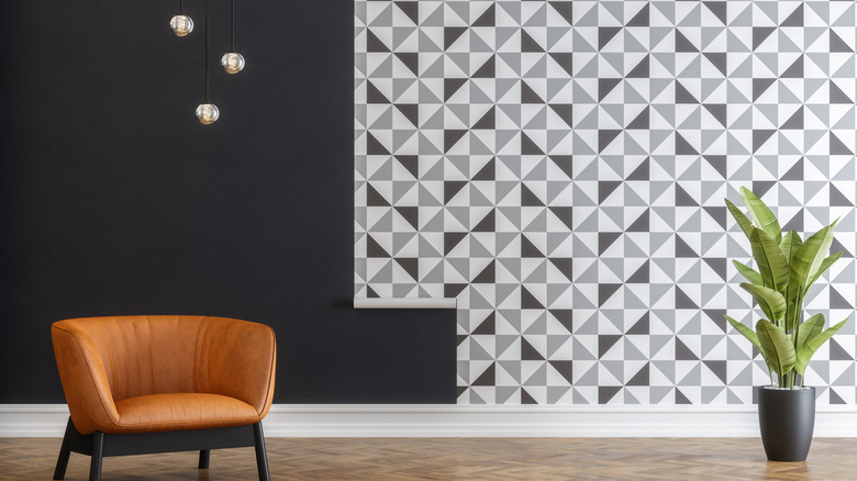 Solid and geometric-print wallpaper with a chair