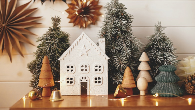Christmas tabletop house and greenery