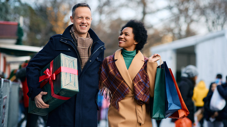 man and woman shopping