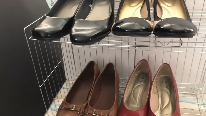 cooling racks from dollar tree are zip-tied together to make a shoe rack