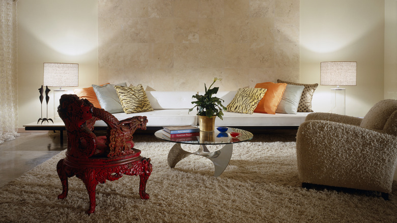 Eclectic living room interior with a mix of vintage and modern designs, unique shapes and textures