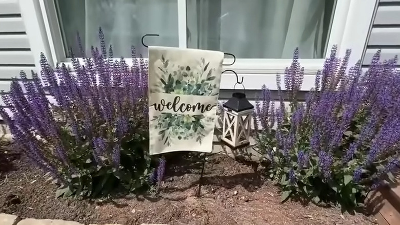 Decorative flag and lantern displayed on a DIY hook