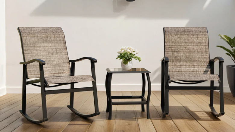 Rocking chairs in brown on patio