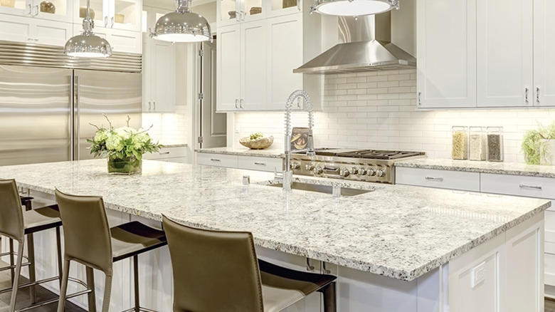 Modern kitchen with Dallas White granite countertops