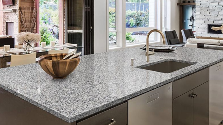 Modern kitchen with Pearl White granite countertops