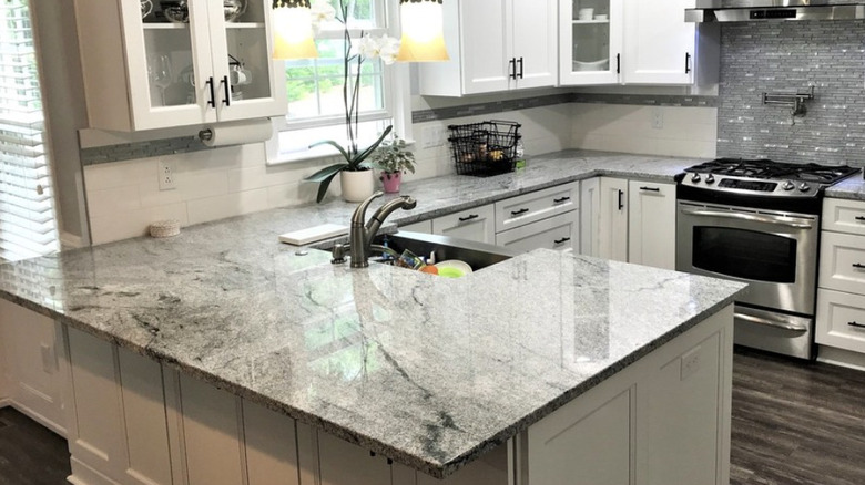 Modern kitchen with Viscont White granite countertops