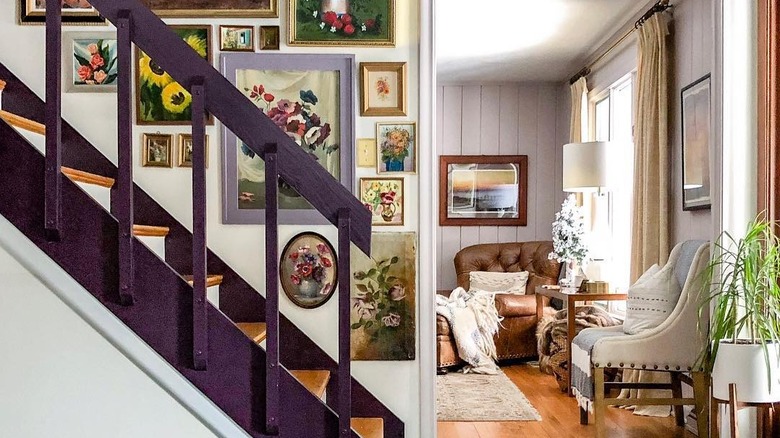 purple banister with colorful art