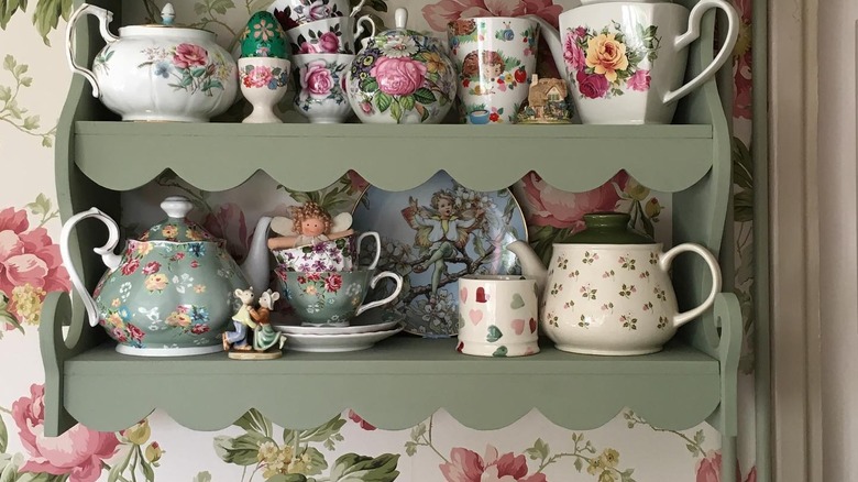 light green shelves with teapots