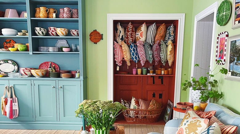 orange painted living room closet