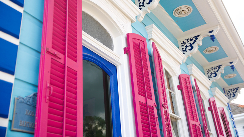 Blue door with pink shutters