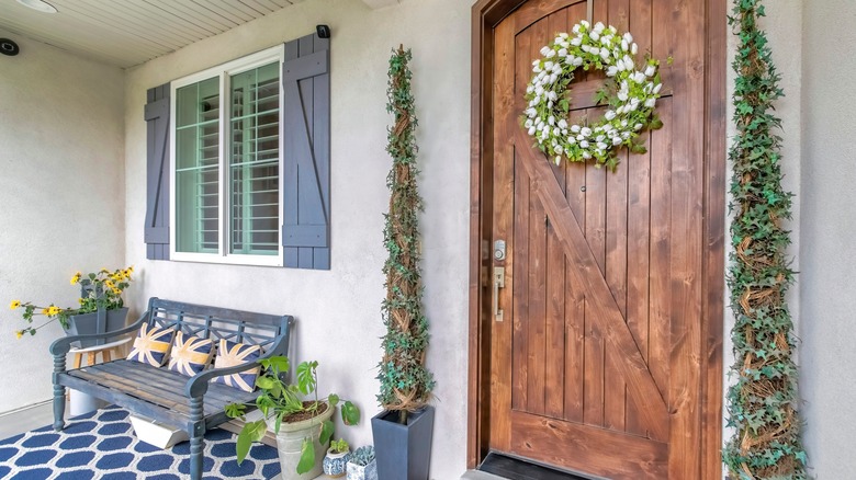 Gray shutters with wood door