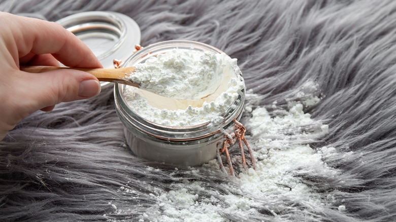 Rug with cornstarch sprinkled on it