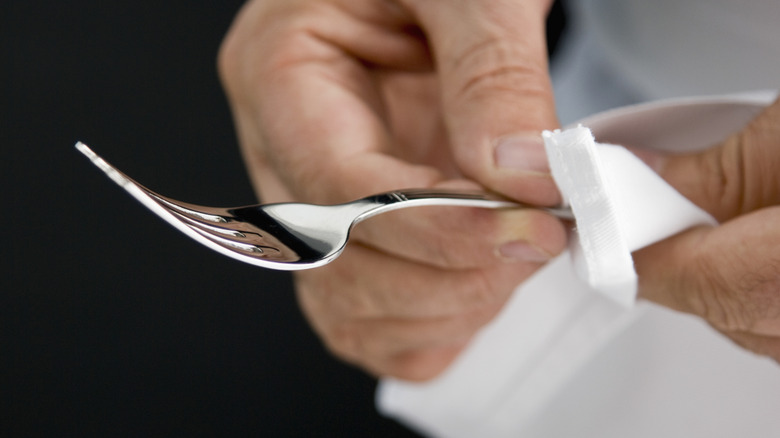 Polishing silver with a cloth
