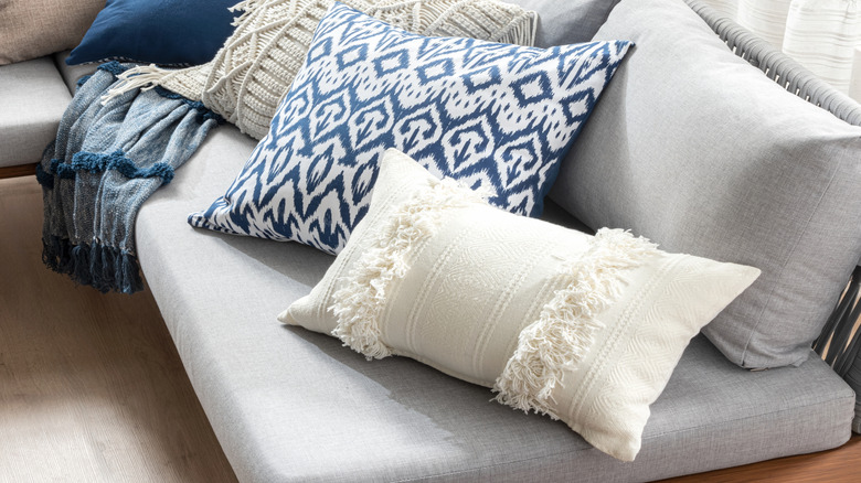 Patterned and textured throw pillows on a couch