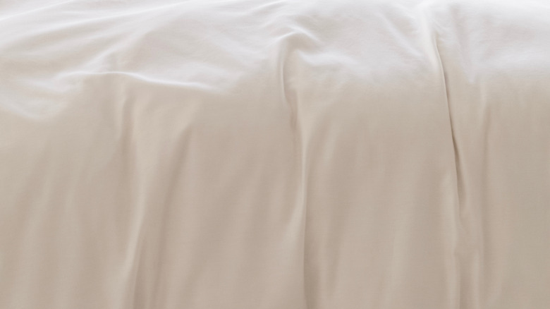 White duvet on bed