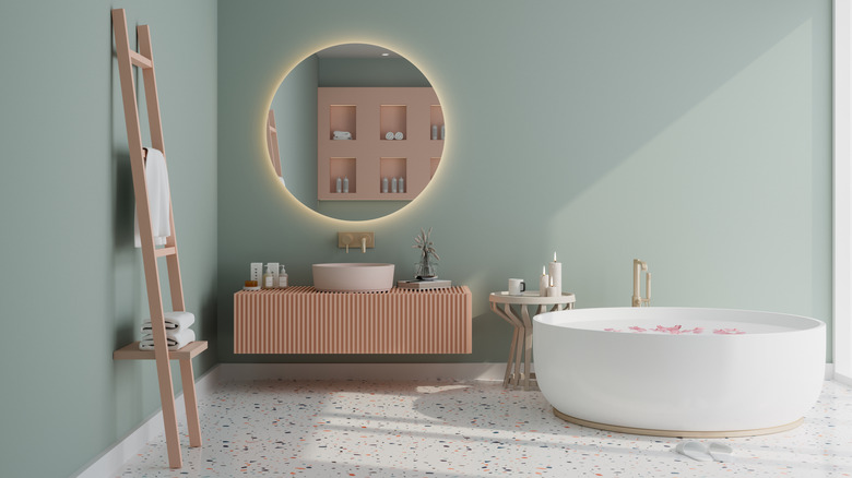 Eucalyptus green bathroom with dusky pink accents