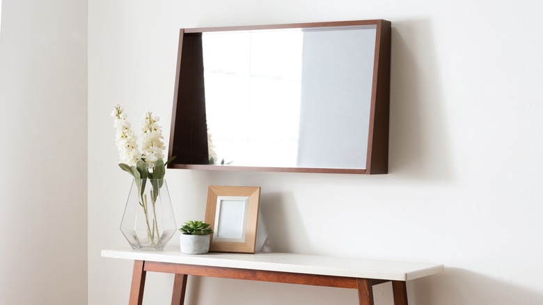 Statement mirror in entryway area