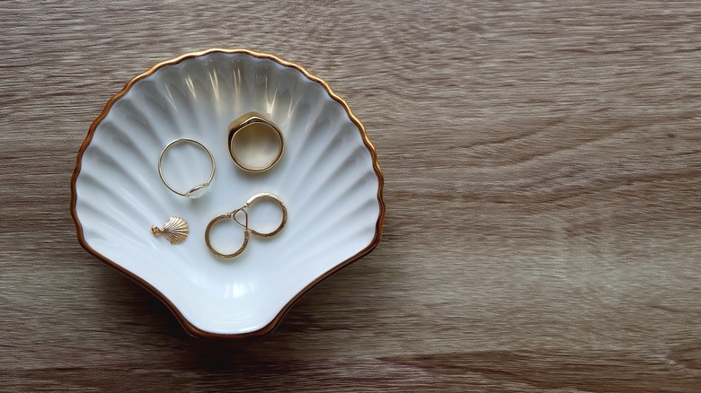 Shell trinket dish with jewelry