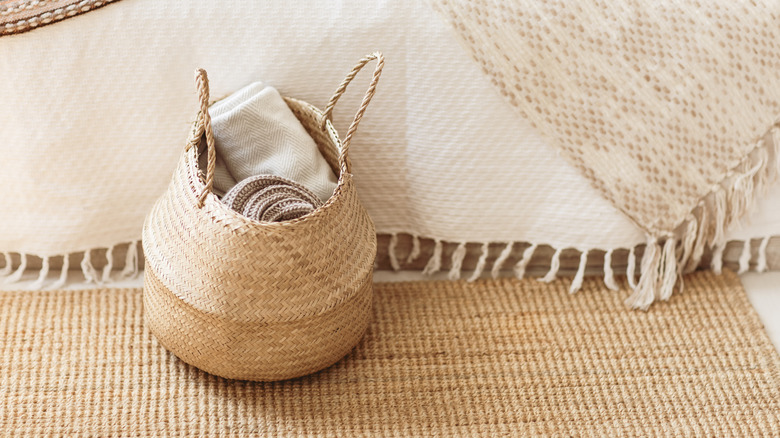 Woven basket on floor