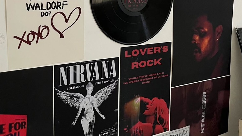 A gallery wall using album covers and records.
