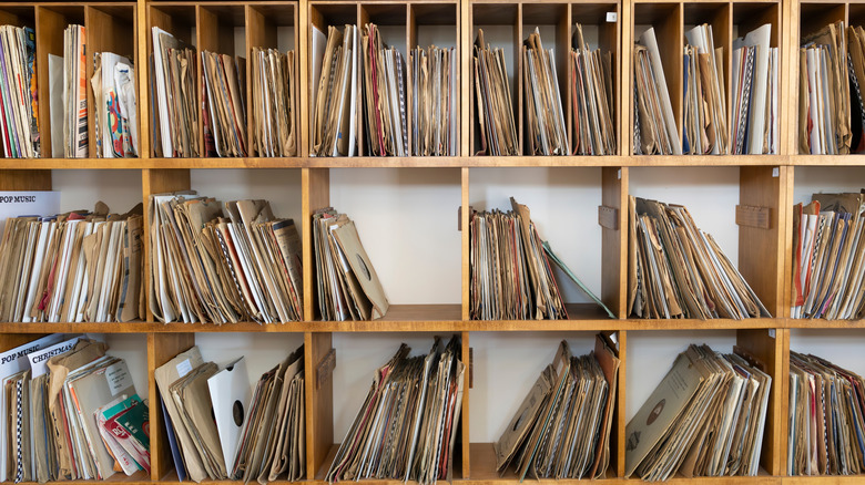 Record album wall and furniture in living room.