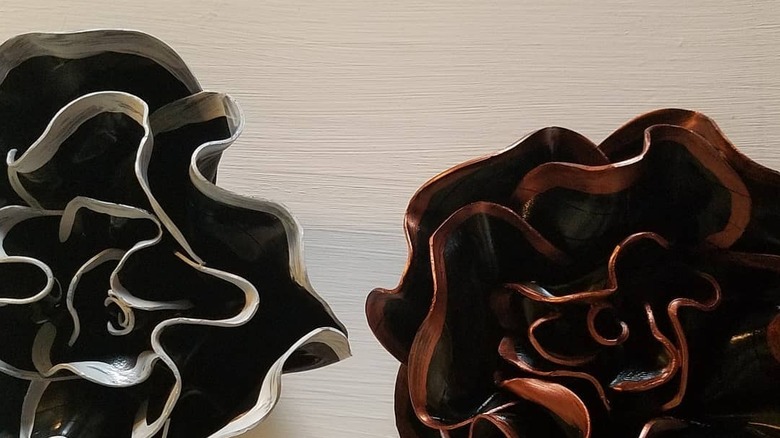 Vinyl albums molded into flowers for the wall.