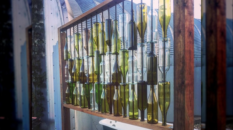 Green glass bottle fence