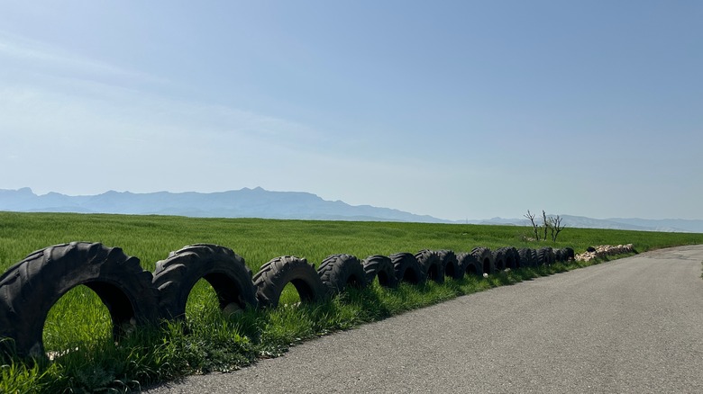 tire fence along road