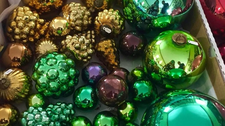 Shiny green, brown, and golden Christmas glass ornaments