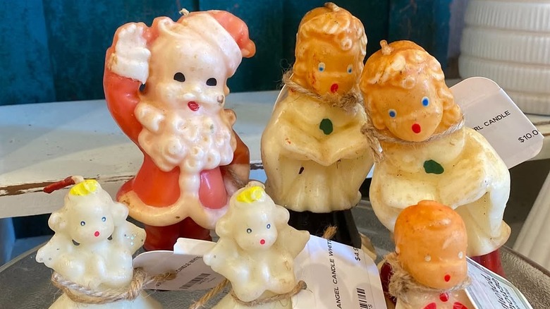 Vintage Gurley Christmas candles in the shape of Santa Claus and caroling angels