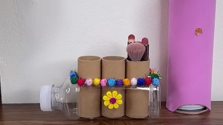 A desk organizer made from toilet paper rolls.