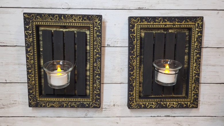 Two tea light candleholders made from picture frames and mini wood pallets