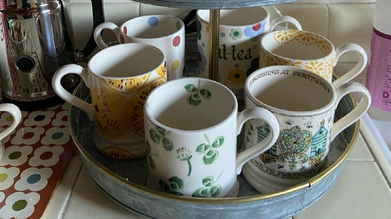 Regular mugs on the low tier of a Lazy Susan