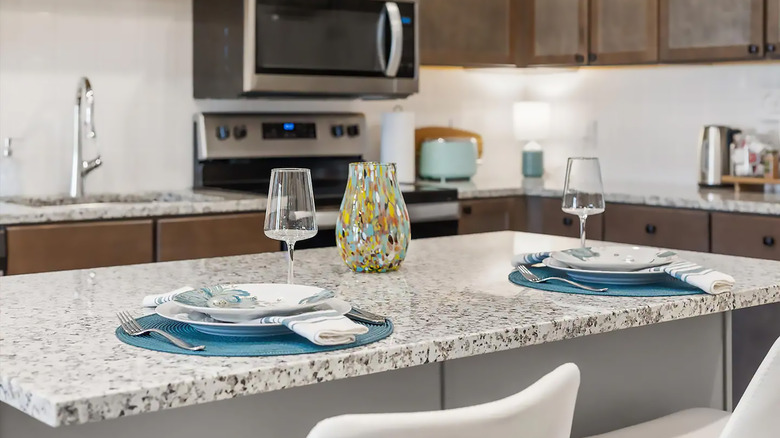 A granite countertop on a kitchen island.