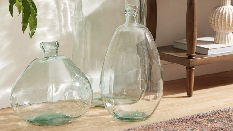 Large glass vases from World Market in a home setting