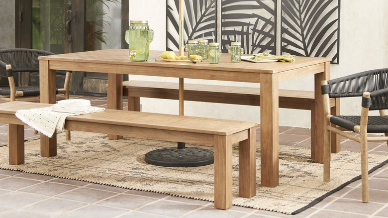 Eucalyptus wood dining table on outdoor patio